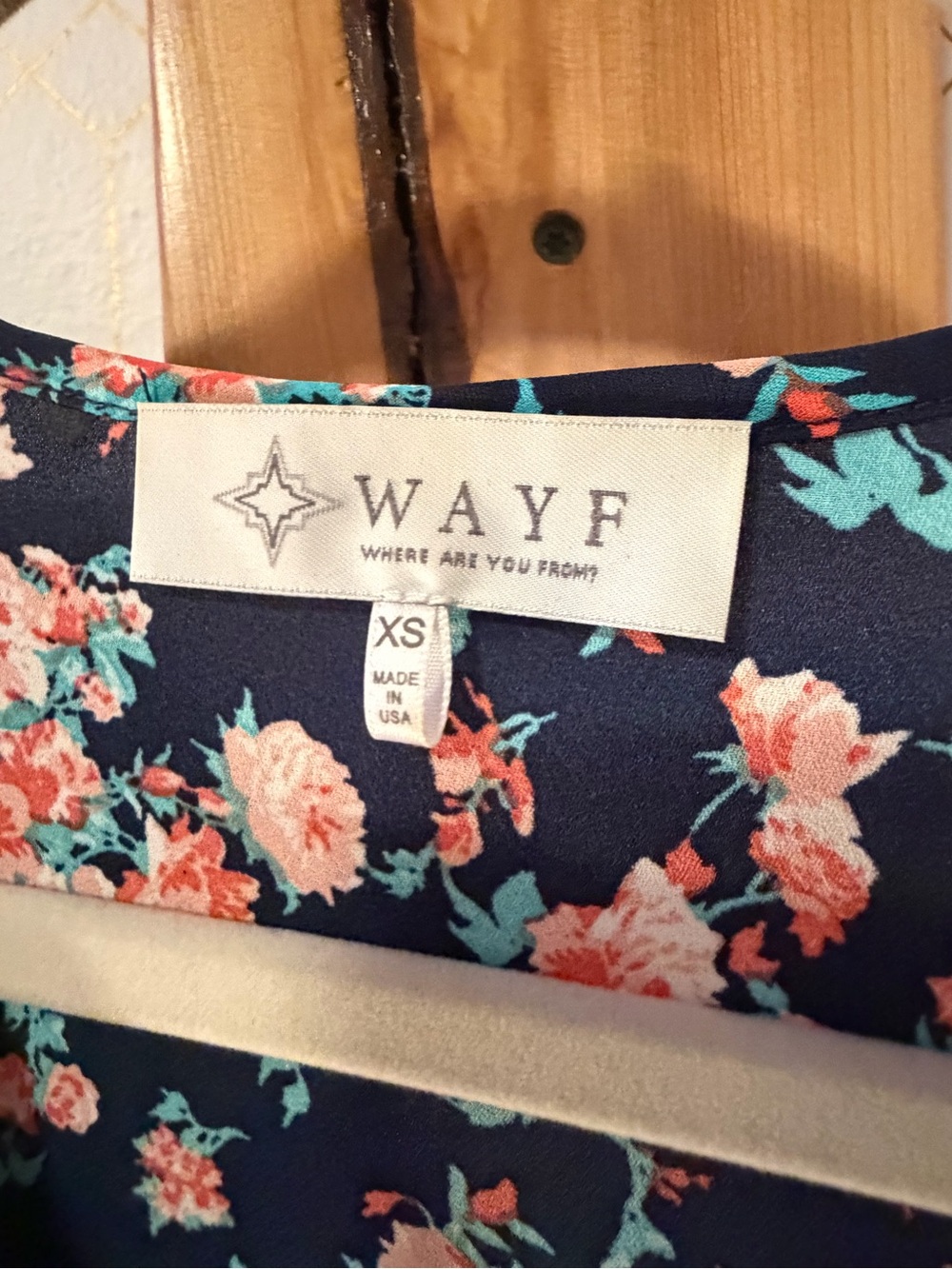 WAYF Navy Floral romper with Coral Pink & Teal Accents